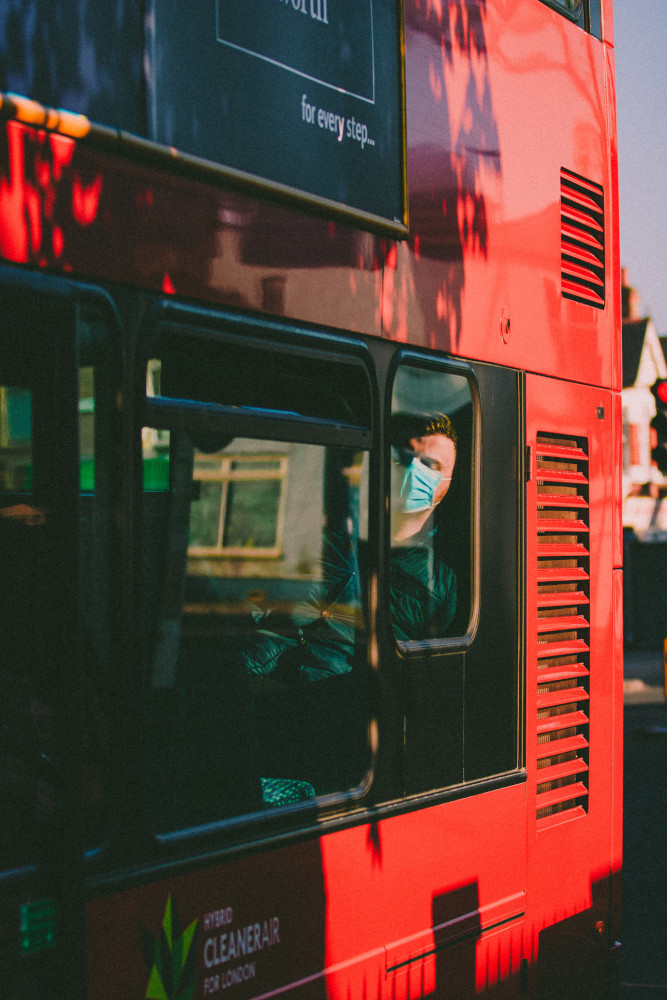 Man sleeping on a bus during the COVID-19 outbreak in London